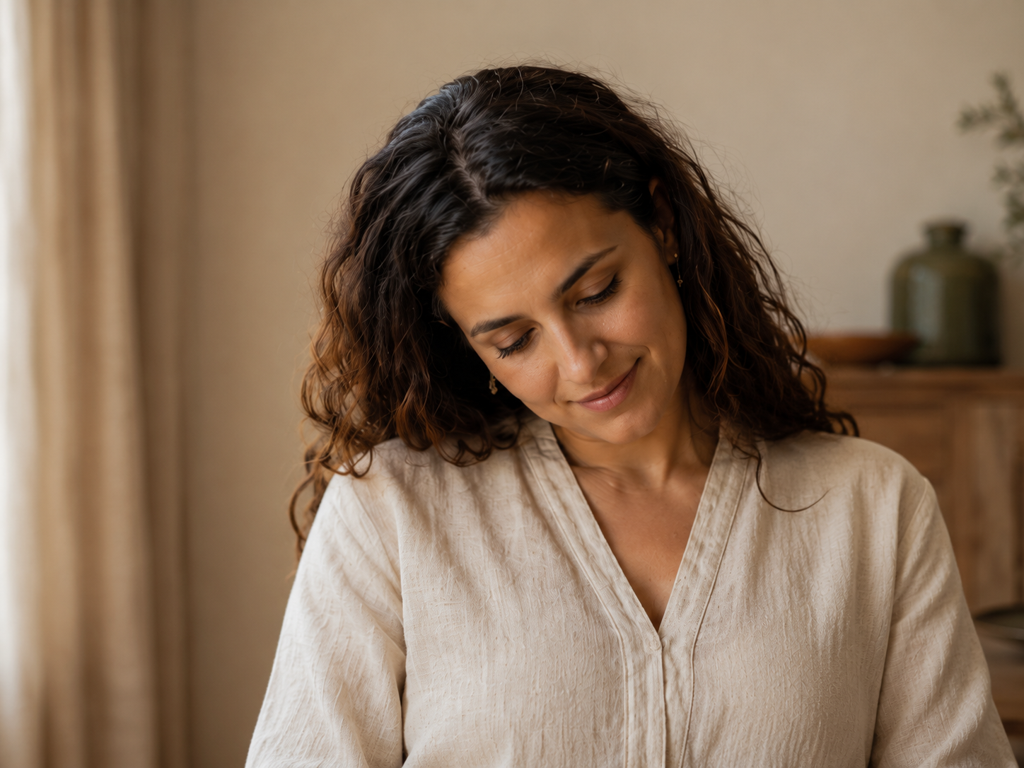 A woman reflecting on her health through life’s transitions